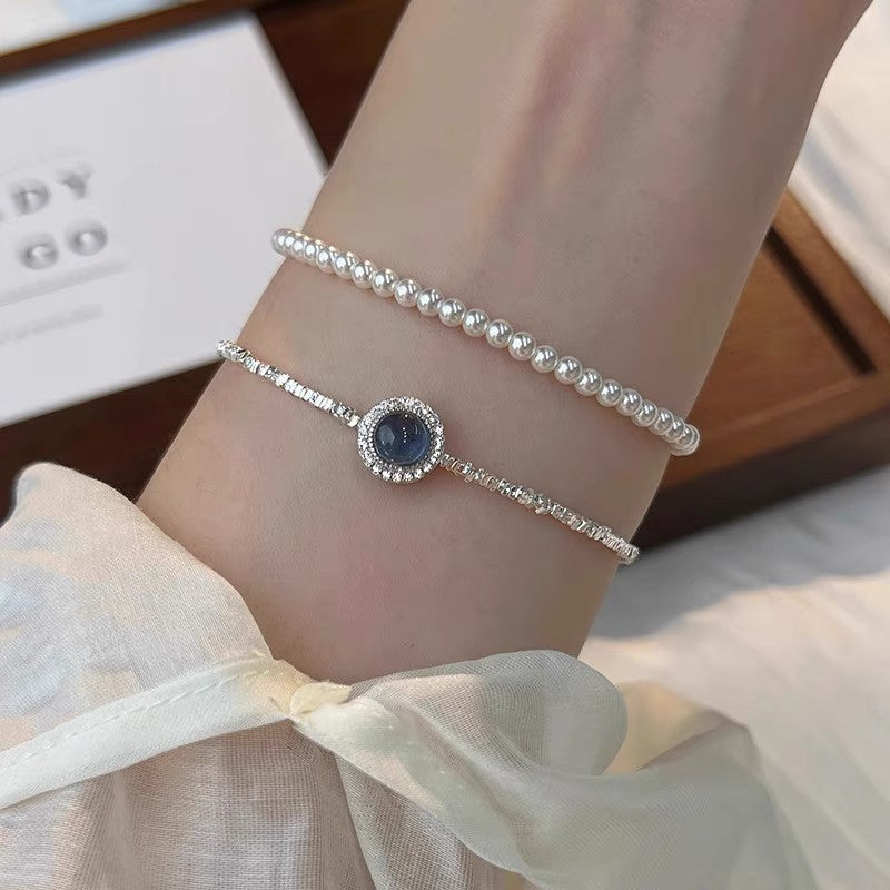 Damen elegante Armbanduhr mit filigranem Design und funkelnden Zirkonia Shop Nory