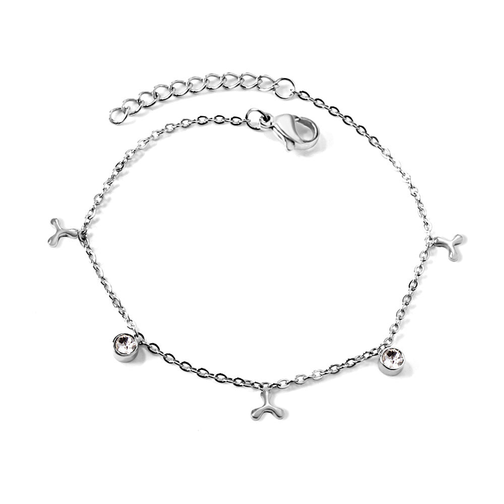 Damen zartes, goldplattiertes Armband mit funkelnden Zirkonia und herzförmigen Anhängern Shop Nory