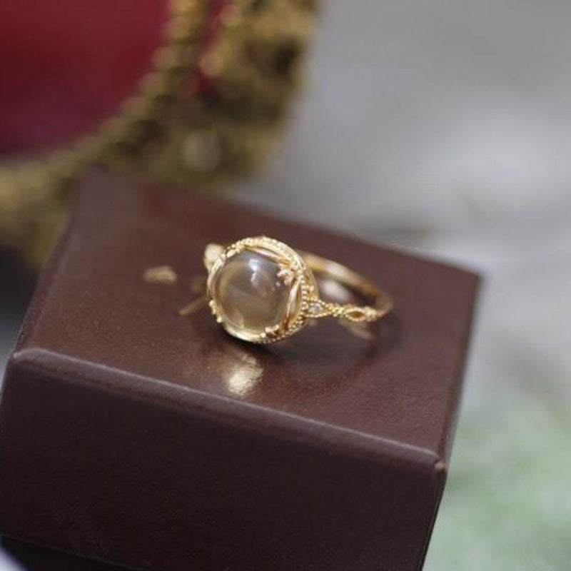 Damenring mit kunstvollem Facettenstein und filigraner Fassung Shop Nory