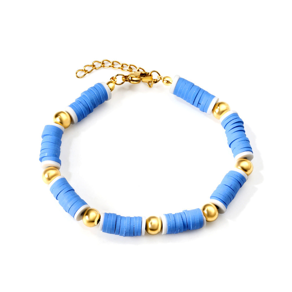 Damen Armband aus hochwertigem Edelstahl mit bunten Perlen und goldplattierten Akzenten Shop Nory