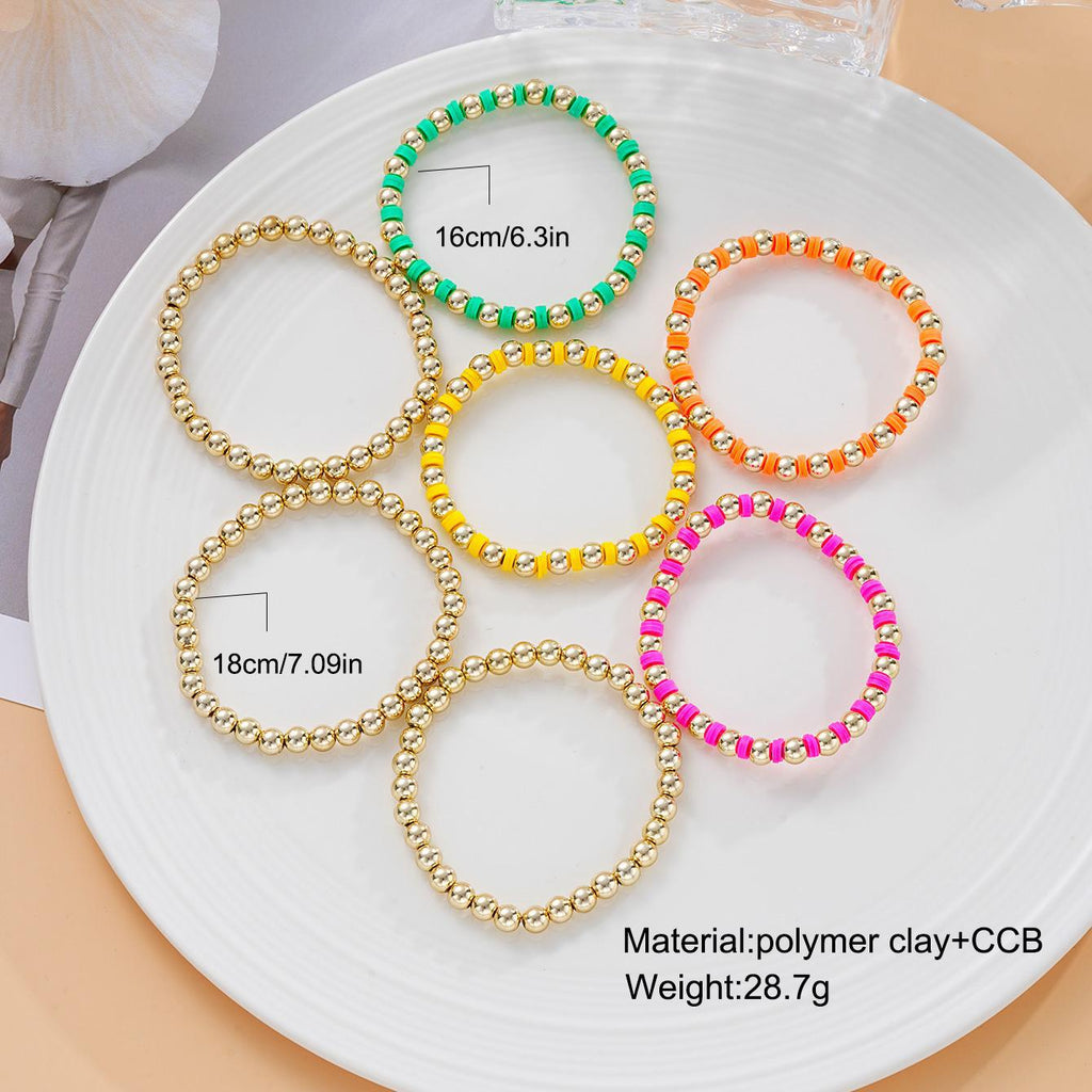 Damen Armband-Set mit bunten Perlen und glänzenden Metallakzenten Shop Nory