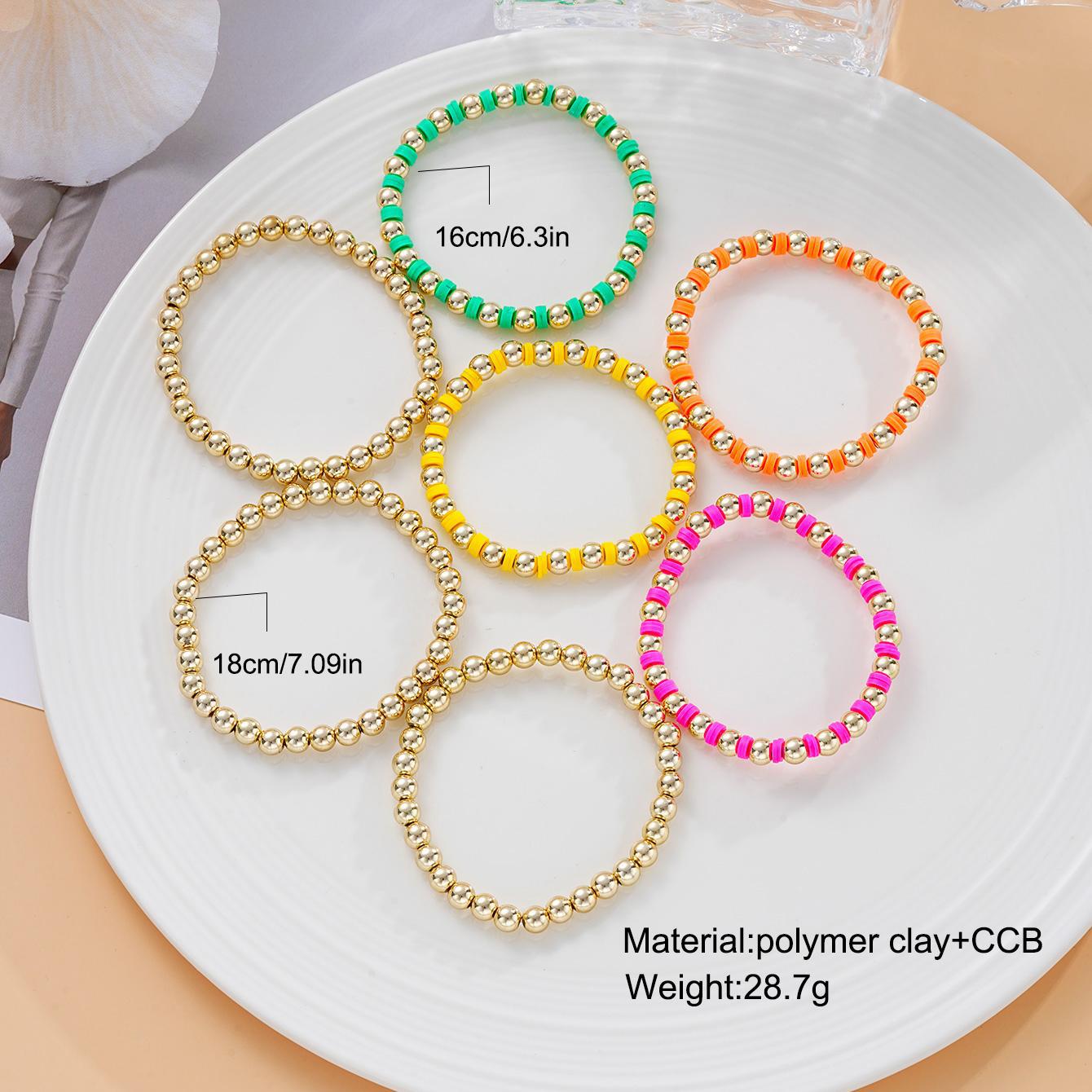Damen Armband-Set mit bunten Perlen und glänzenden Metallakzenten Shop Nory