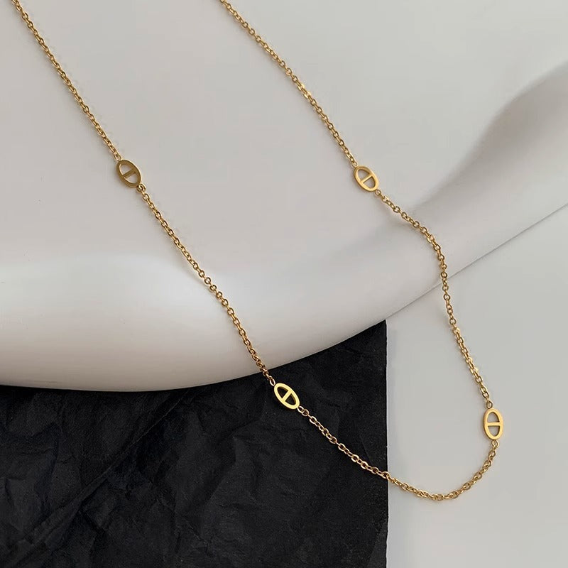 Damen Halskette mit kreativem Ovaldesign und feiner Gliederkette Shop Nory