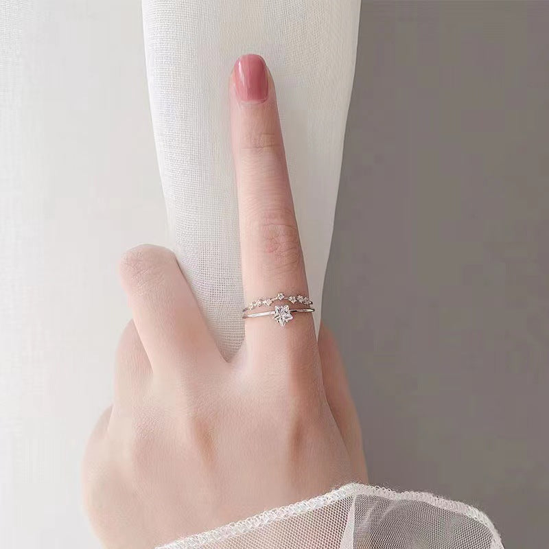 Damenring mit funkelnden Kristallen und kunstvollem Design Shop Nory