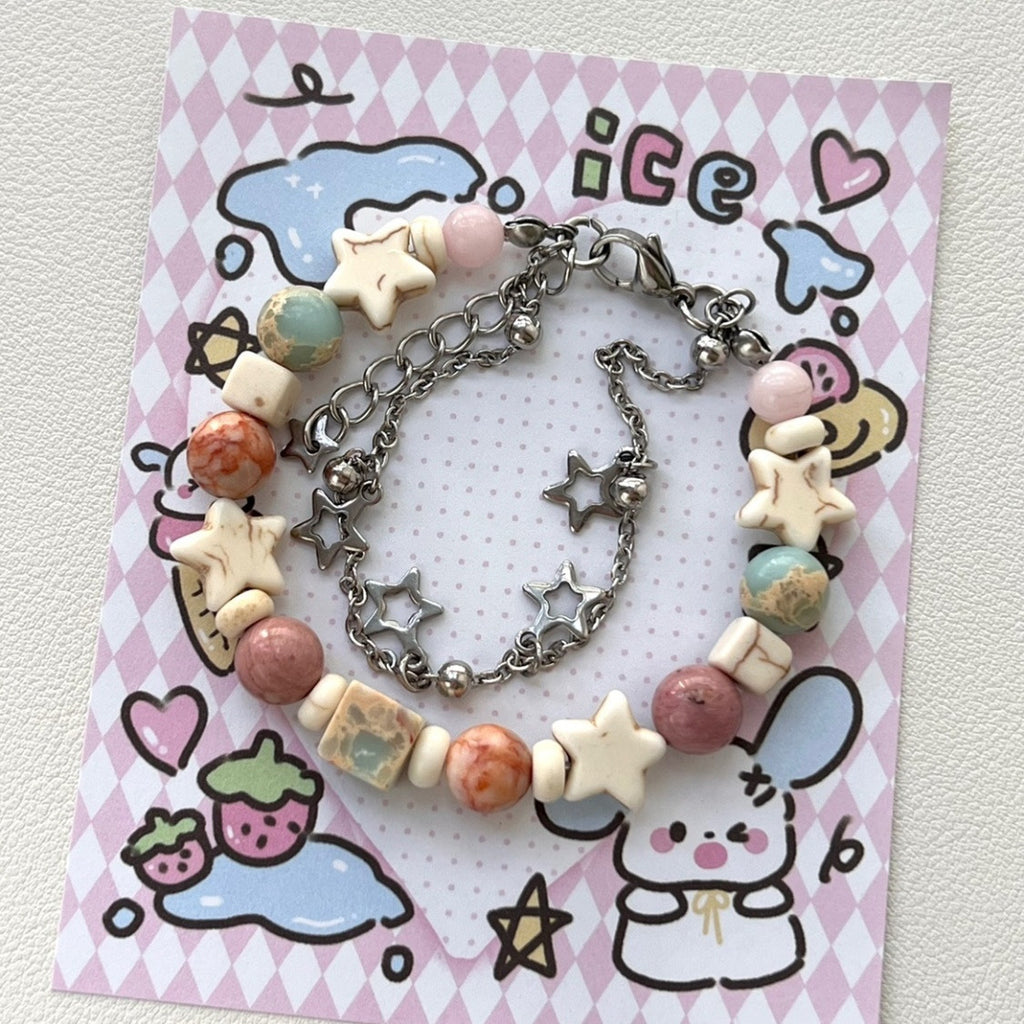 Damen Armband mit bunten Halbedelsteinen und funkelndem Sternenanhänger Shop Nory