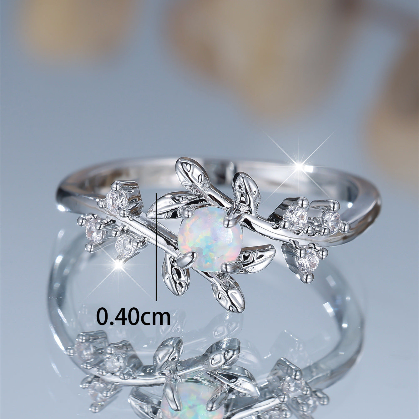 Damen Ring mit kunstvollem Blatt-Design und funkelndem Opal Shop Nory