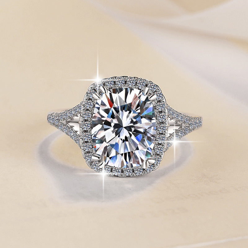 Damen Verlobungsring mit elegantem facettiertem Hauptstein und funkelndem Zirkonia-Besatz Shop Nory