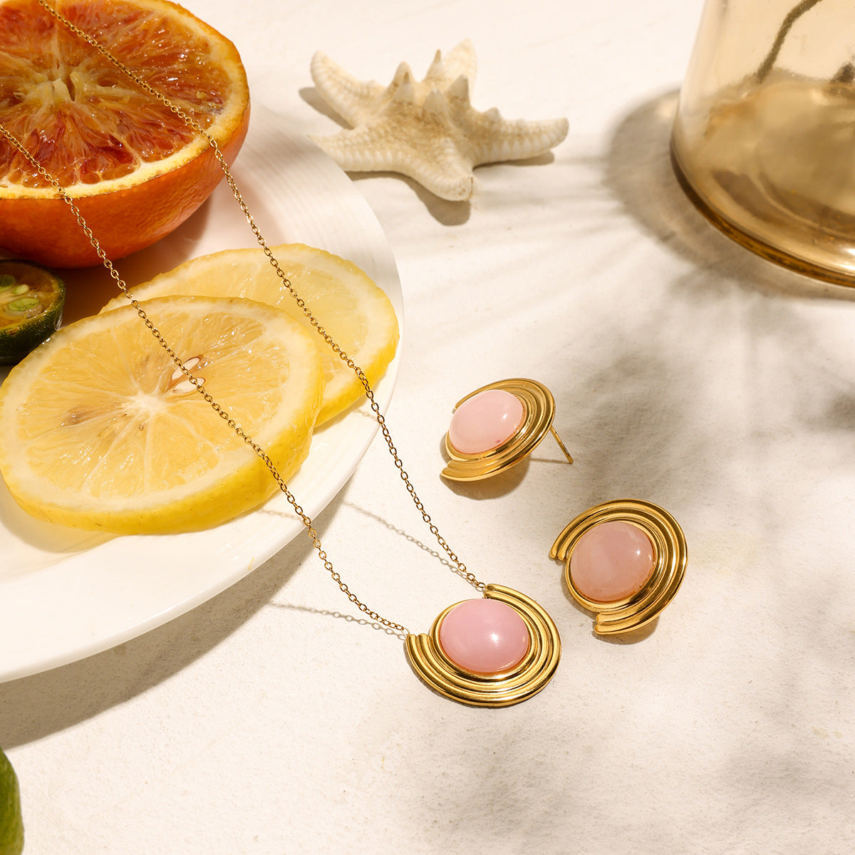 Damenohrringe mit rosa Stein und Goldrahmen Shop Nory