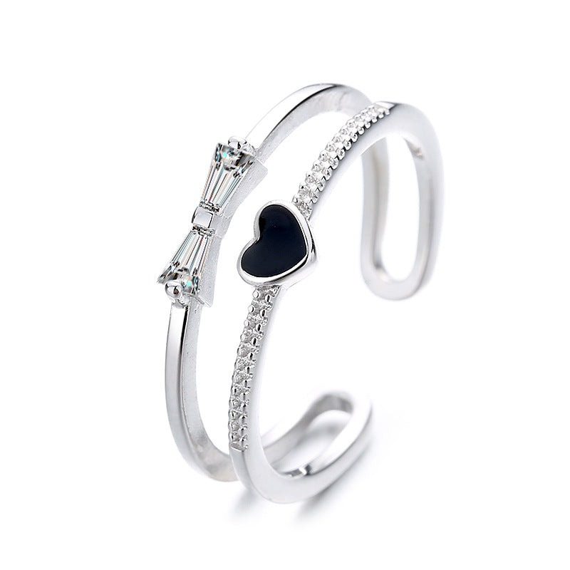 Damen offenes Armband mit mutigem Herz- und Schleifenmotiv Shop Nory