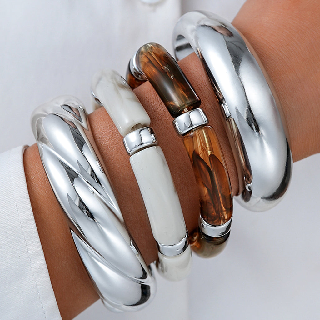 Damenarmreif mit geschwungenem Design und glänzender Oberfläche Shop Nory