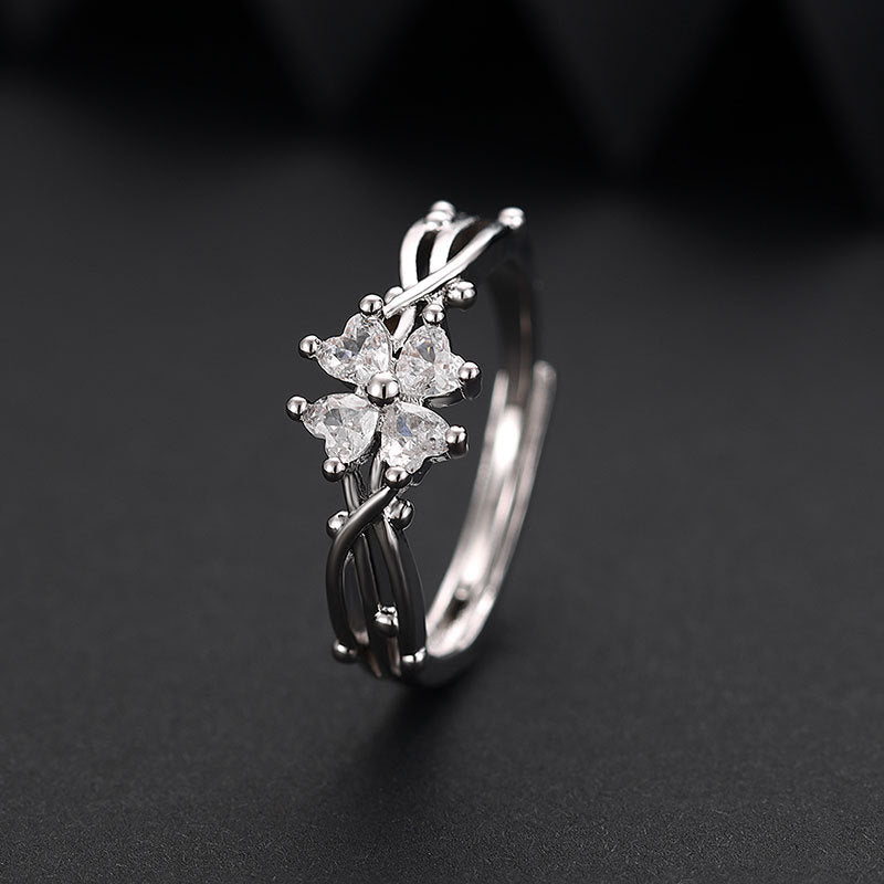 Damenring mit floralem Design und funkelnden pinken Zirkonia-Steinen Shop Nory