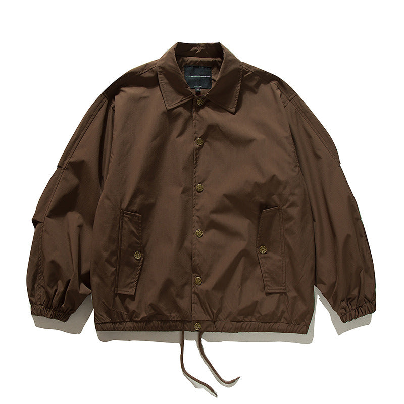 Unisex Boxy-Übergangsjacke im Bomberstil mit Tunnelzugsaum und Druckknopfleiste Shop Nory
