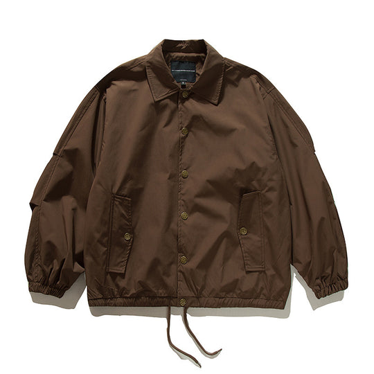 Unisex Boxy-Übergangsjacke im Bomberstil mit Tunnelzugsaum und Druckknopfleiste Shop Nory