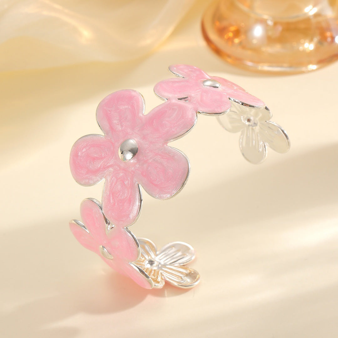 Damen Armreif aus hochwertigem Metall mit floralem Design Shop Nory