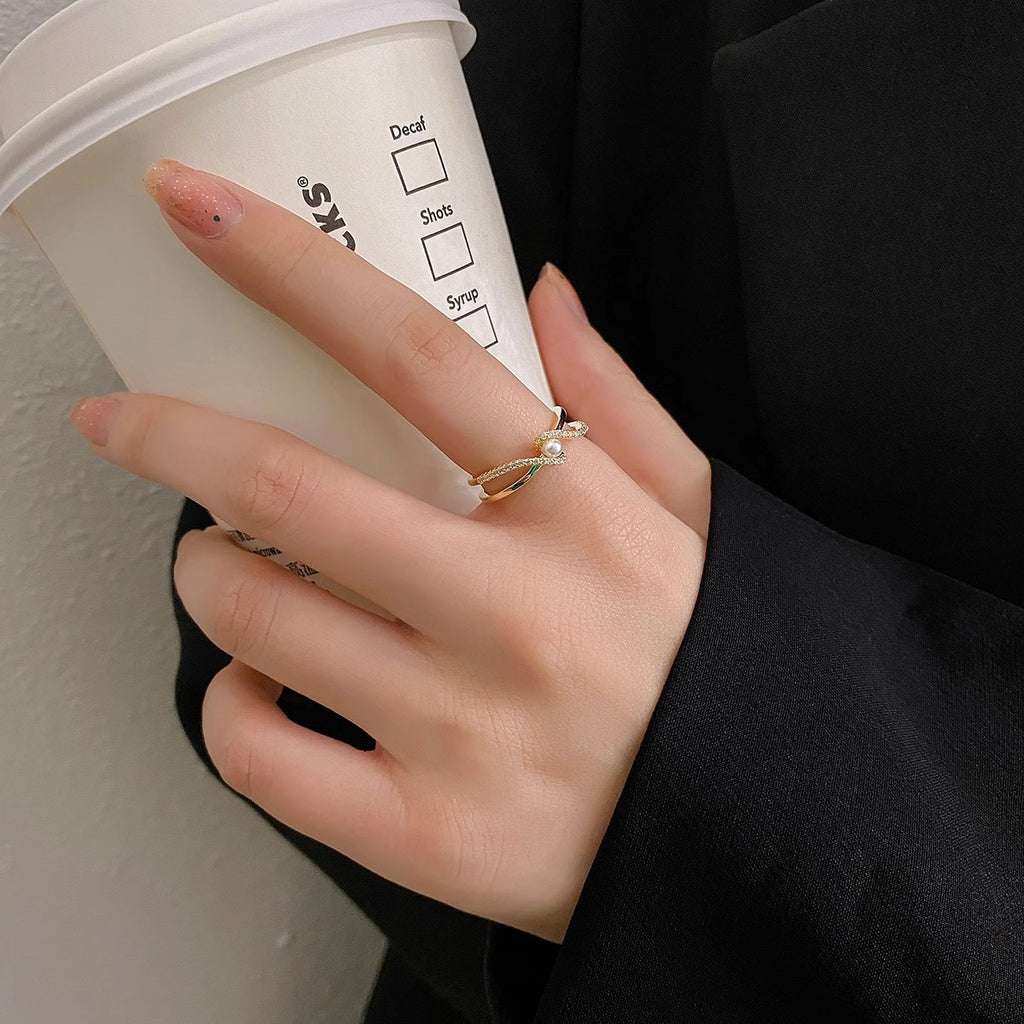 Damen eleganter Spiralring mit zeitlosen Perlen- und Zirkonia-Akzenten Shop Nory