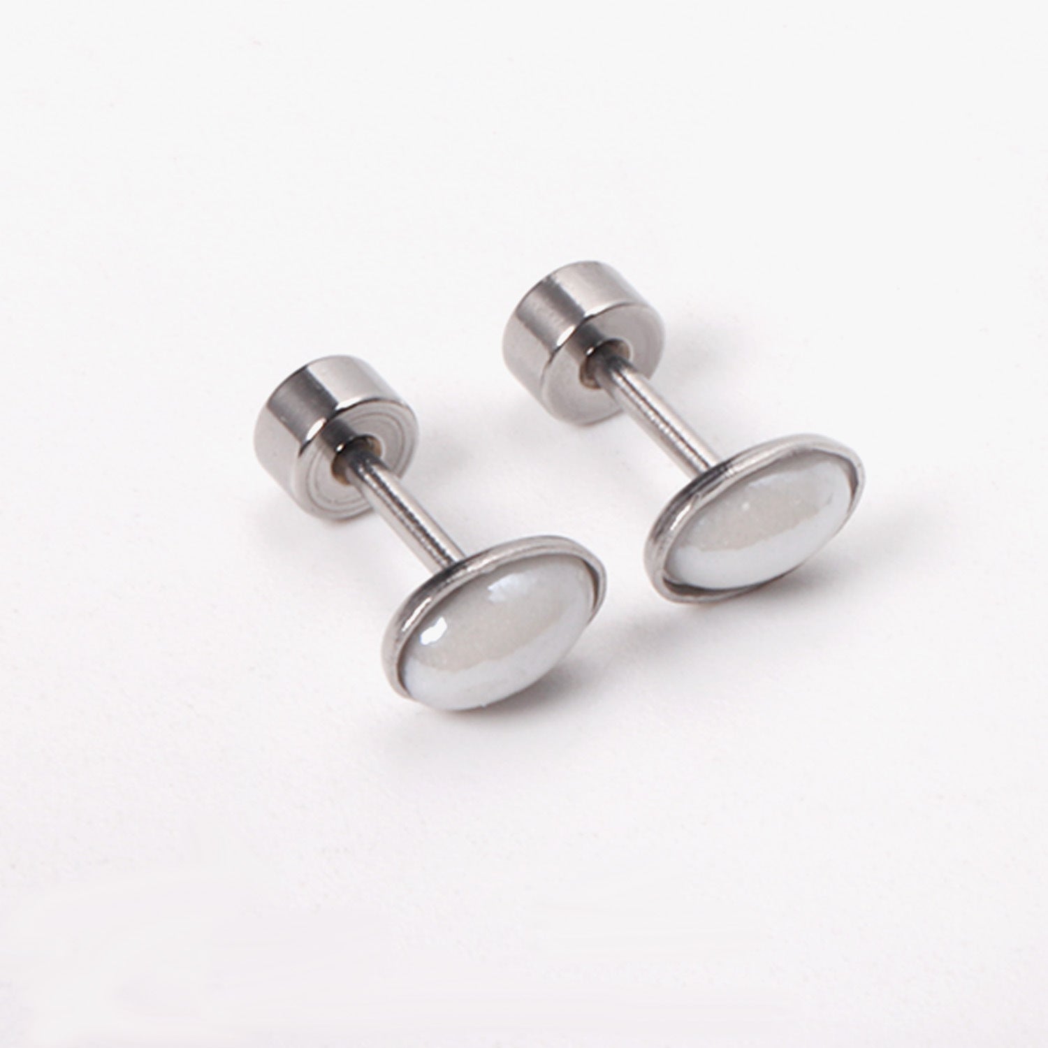 Damen Ohrstecker aus antiallergischem Edelstahl mit elegantem, geschwungenem Design Shop Nory