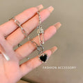 Damen Halskette mit Herzanhänger und modischen Sicherheitsnadel-Details Shop Nory