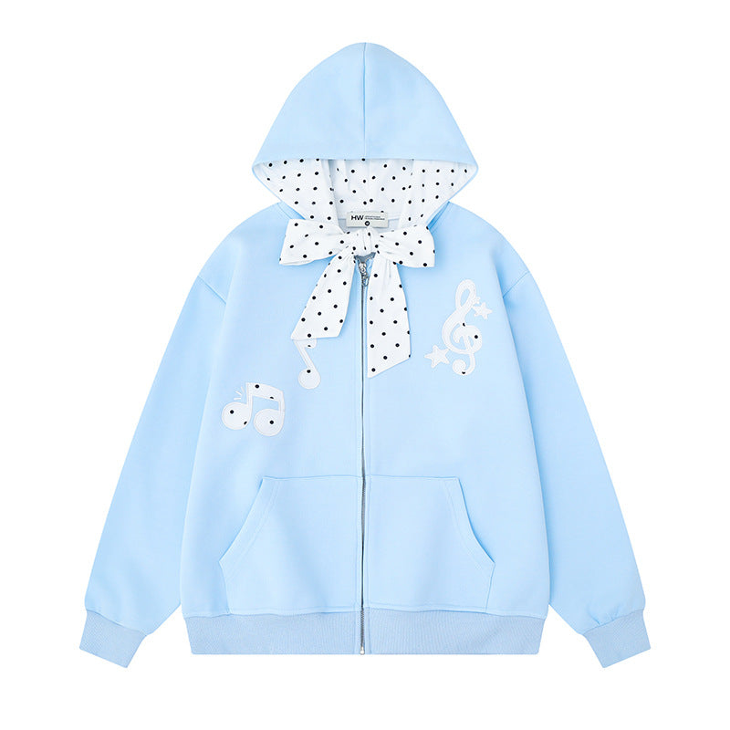 Damen Kapuzensweatjacke mit gepünktetem Kapuzenfutter, dekorativer Schleife und Notenmotiv Shop Nory