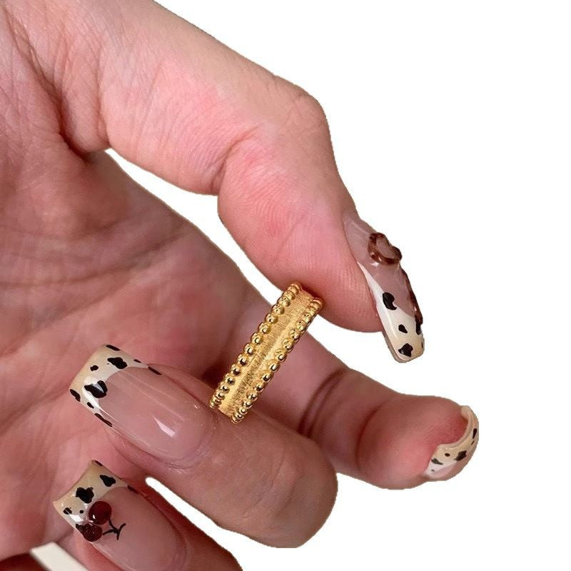 Damen eleganter goldfarbener Ring mit feinen strukturierten Mustern Shop Nory