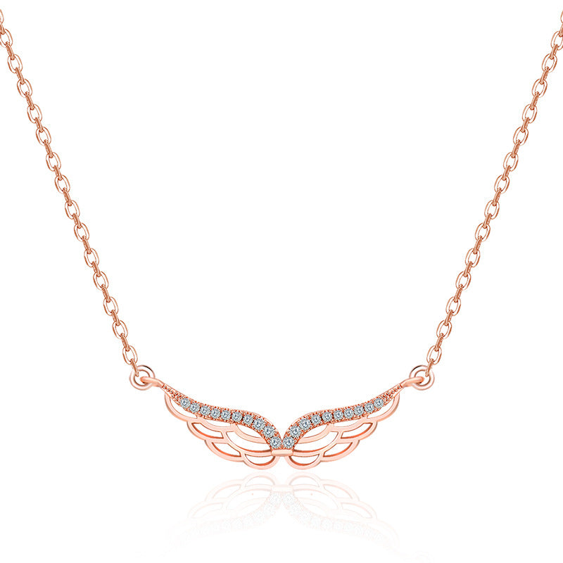 Damen Halskette mit elegantem Flügelanhänger und funkelnden Zirkonia Shop Nory