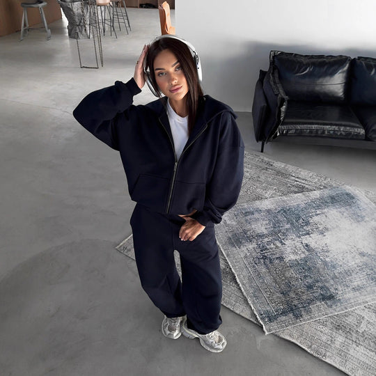 Damen lässiges Zip-Lounge-Set mit übergroßer Kapuzenjacke und taillierter Relax-Jogginghose Shop Nory