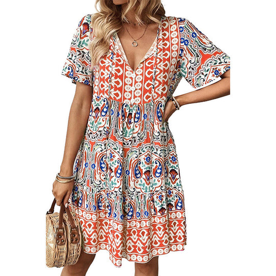 Damen Lockeres Stufen‑Midikleid mit V‑Ausschnitt, Quastenbindeband und Boho‑Print Shop Nory