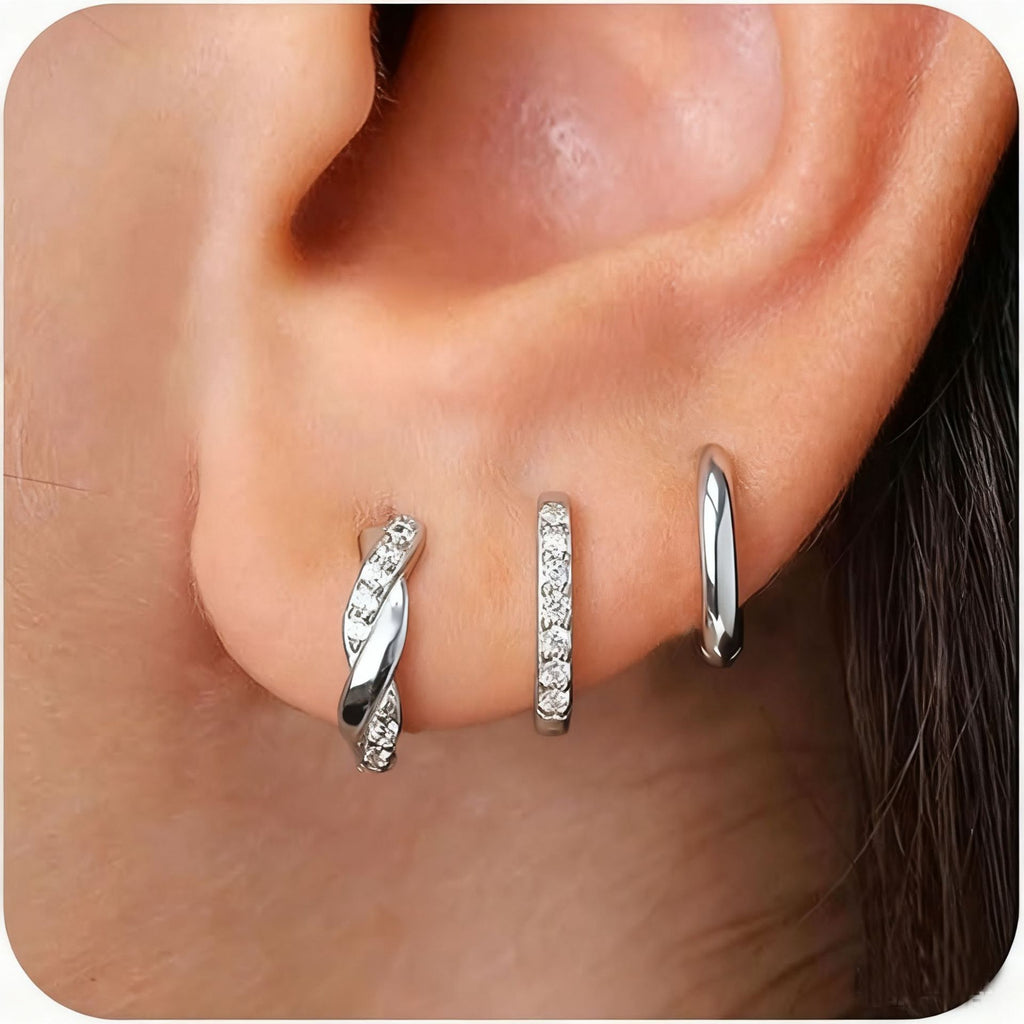 Damen Ohrstecker-Set mit funkelnden Zirkonia und geschwungenem Design Shop Nory