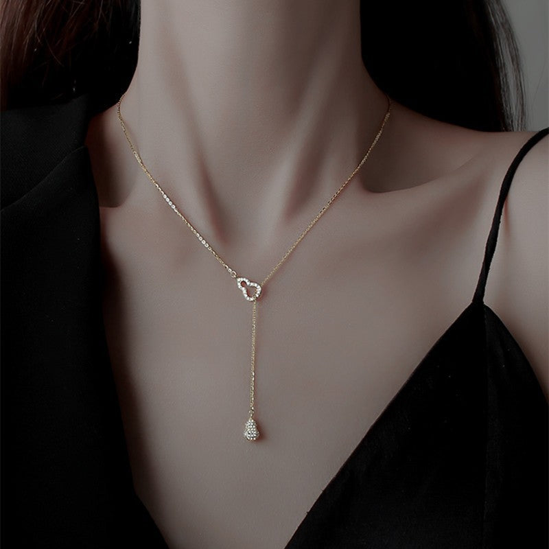 Damen Halskette mit verspieltem Design und funkelnden Akzenten Shop Nory