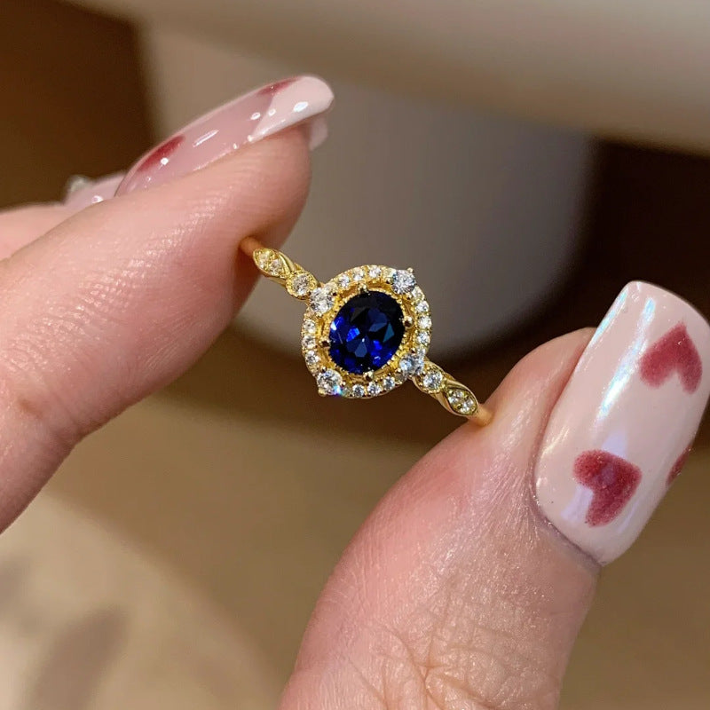Damenring mit strahlendem blauen Edelstein und funkelnden Zirkonia Shop Nory