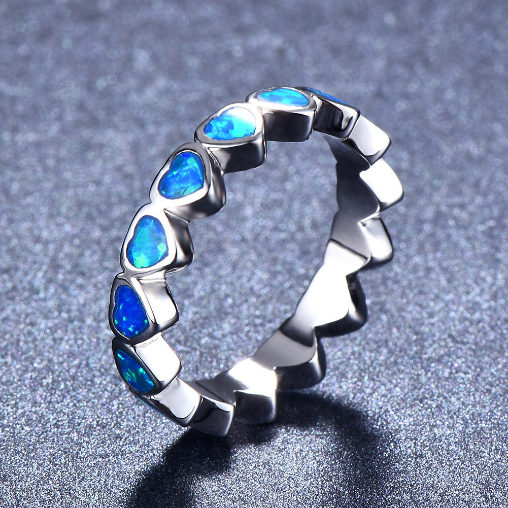 Damen Ring mit schillernden Opalsteinen und eleganter Edelstahlfassung Shop Nory