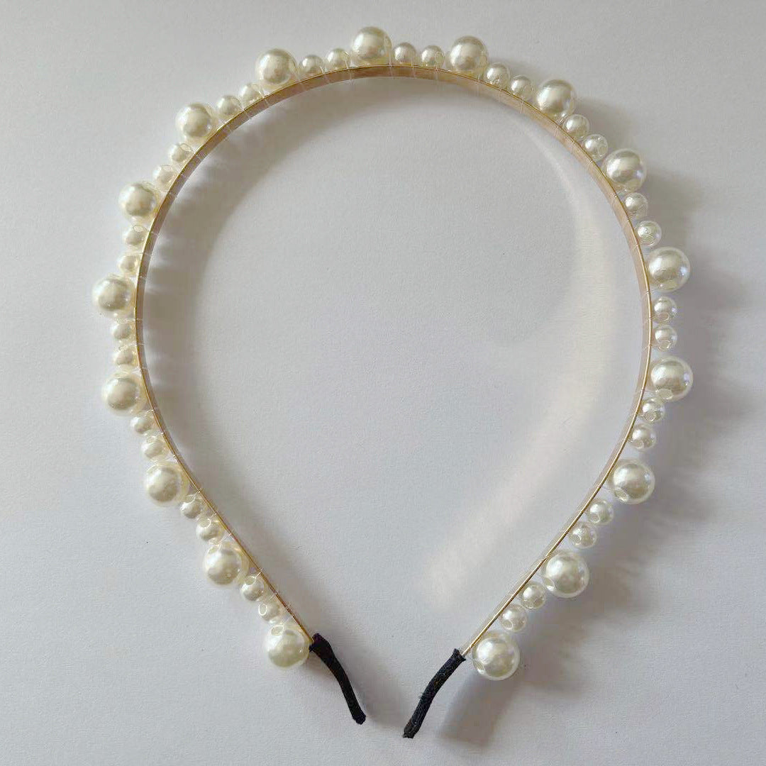 Damen Haarband mit eleganten Perlenakzenten Shop Nory