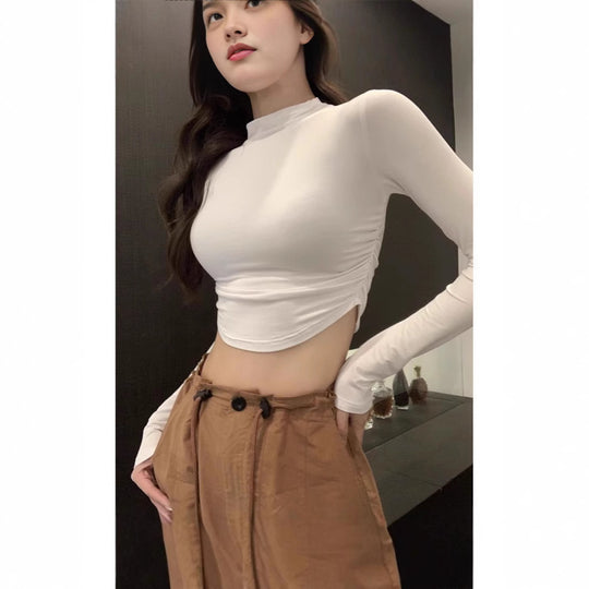 Damen Figurnahes Langarm-Cropped-Top mit Stehkragen, seitlicher Raffung und verlängerten Ärmeln Shop Nory