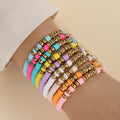 Damen Armband-Set mit bunten Perlen und goldenen Akzenten Shop Nory