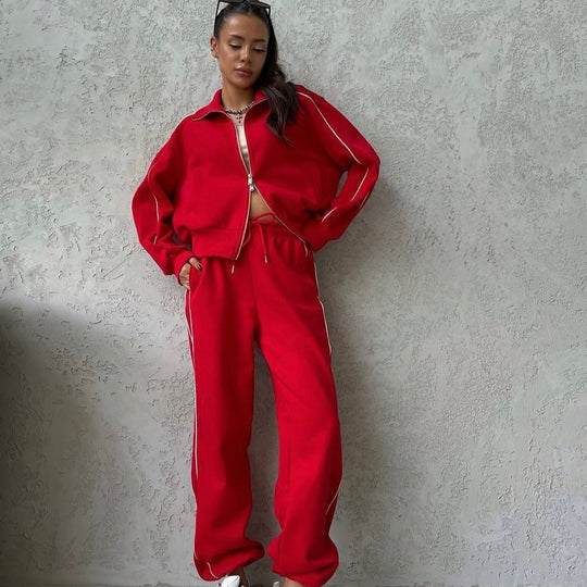 Damen lässiges Sweatset mit Stehkragen Reißverschluss gekürzter Jacke und hochtaillierter Schlaghose Shop Nory