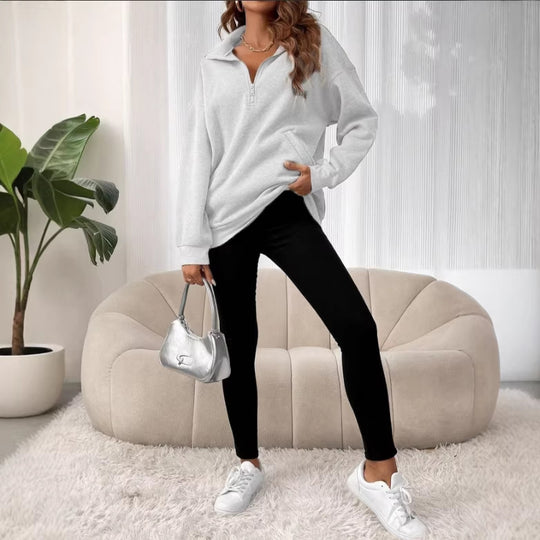 Damen Oversize Sweatshirt mit halbem Reißverschluss, Kängurutasche und Stehkragen Shop Nory