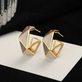 Damen Ohrringe mit modernem, geometrischem Design und elegantem Goldfinish Shop Nory