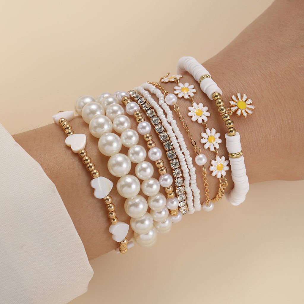 Damen Armband-Set mit stilvollen Perlen und bunten Blumenanhängern Shop Nory