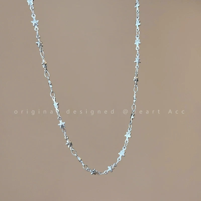 Damen Halskette mit funkelndem Sternanhänger und eleganter Gliederkette Shop Nory