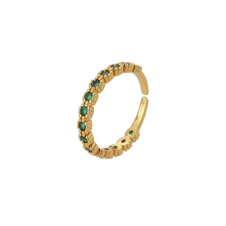 Damen Offener Ring mit funkelnden grünen Steinen und elegantem Golddesign Shop Nory