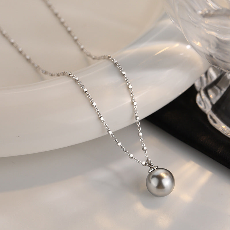 Damen elegante Halskette mit zeitlosem Perlenanhänger und feinem Kettendesign Shop Nory
