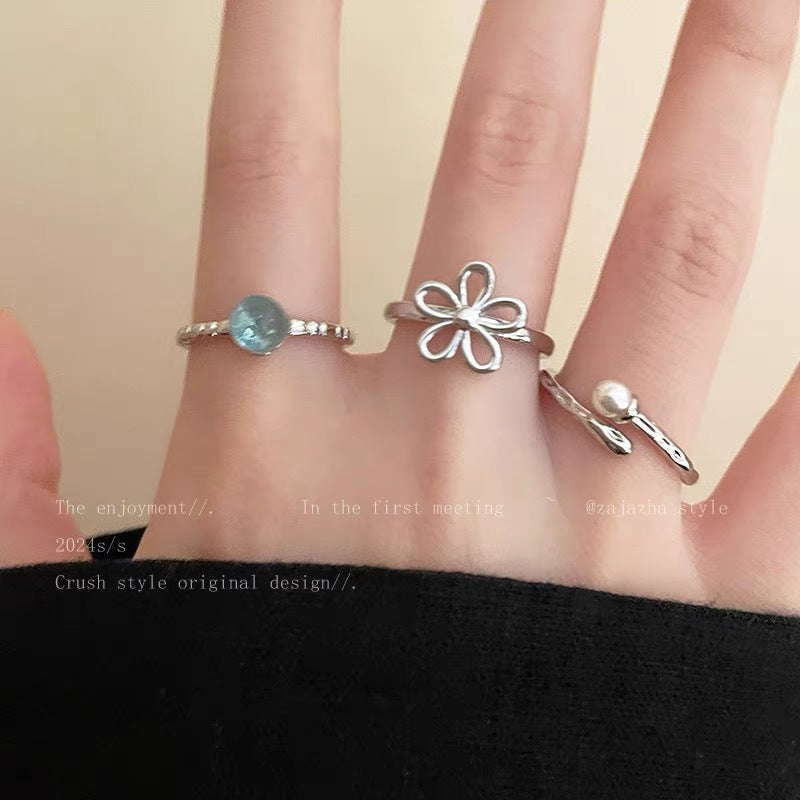 Damen Ring-Set mit filigranen Blütenmotiven und elegantem Edelsteindetail Shop Nory