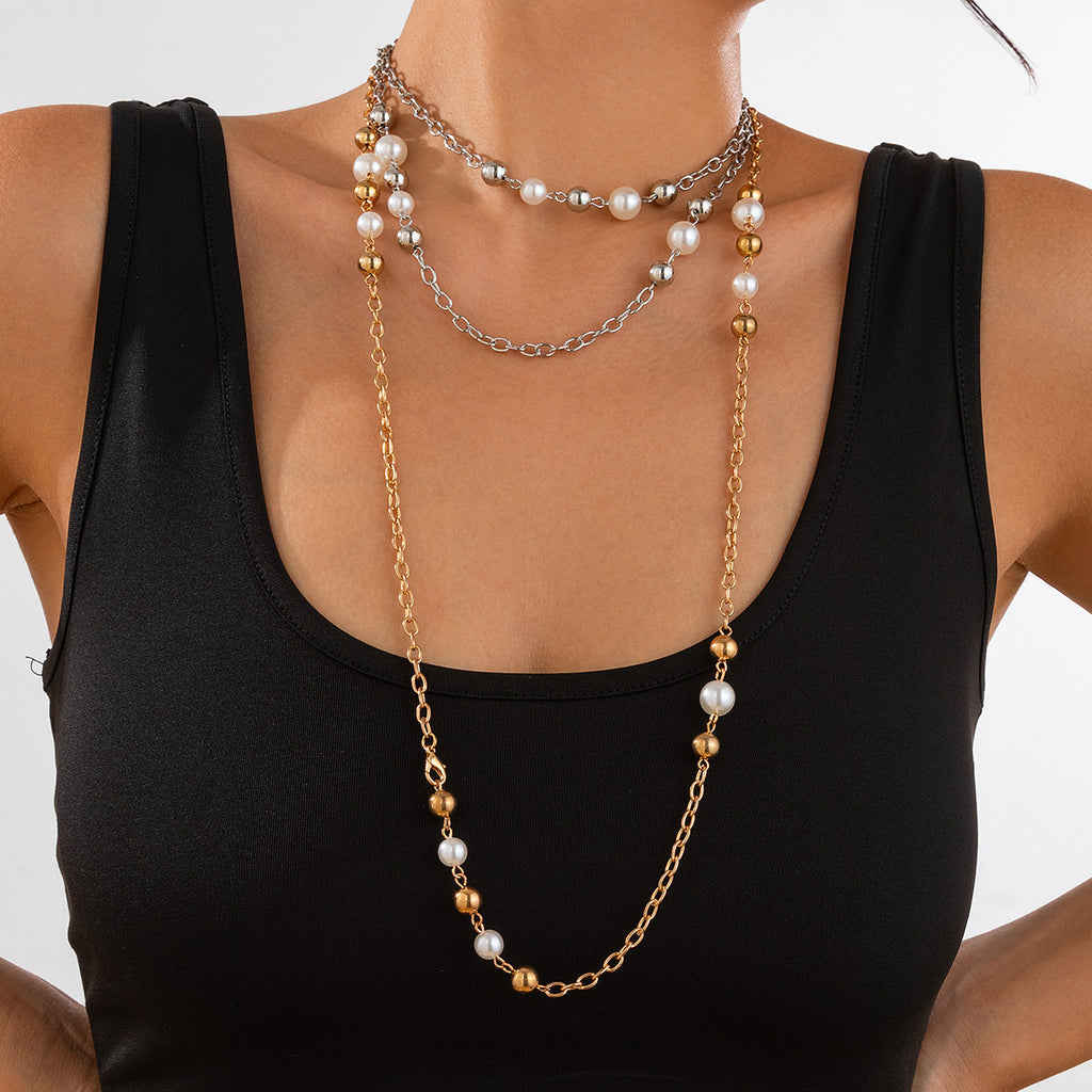Damen Halskette mit Perlen und goldfarbenen Akzenten Shop Nory