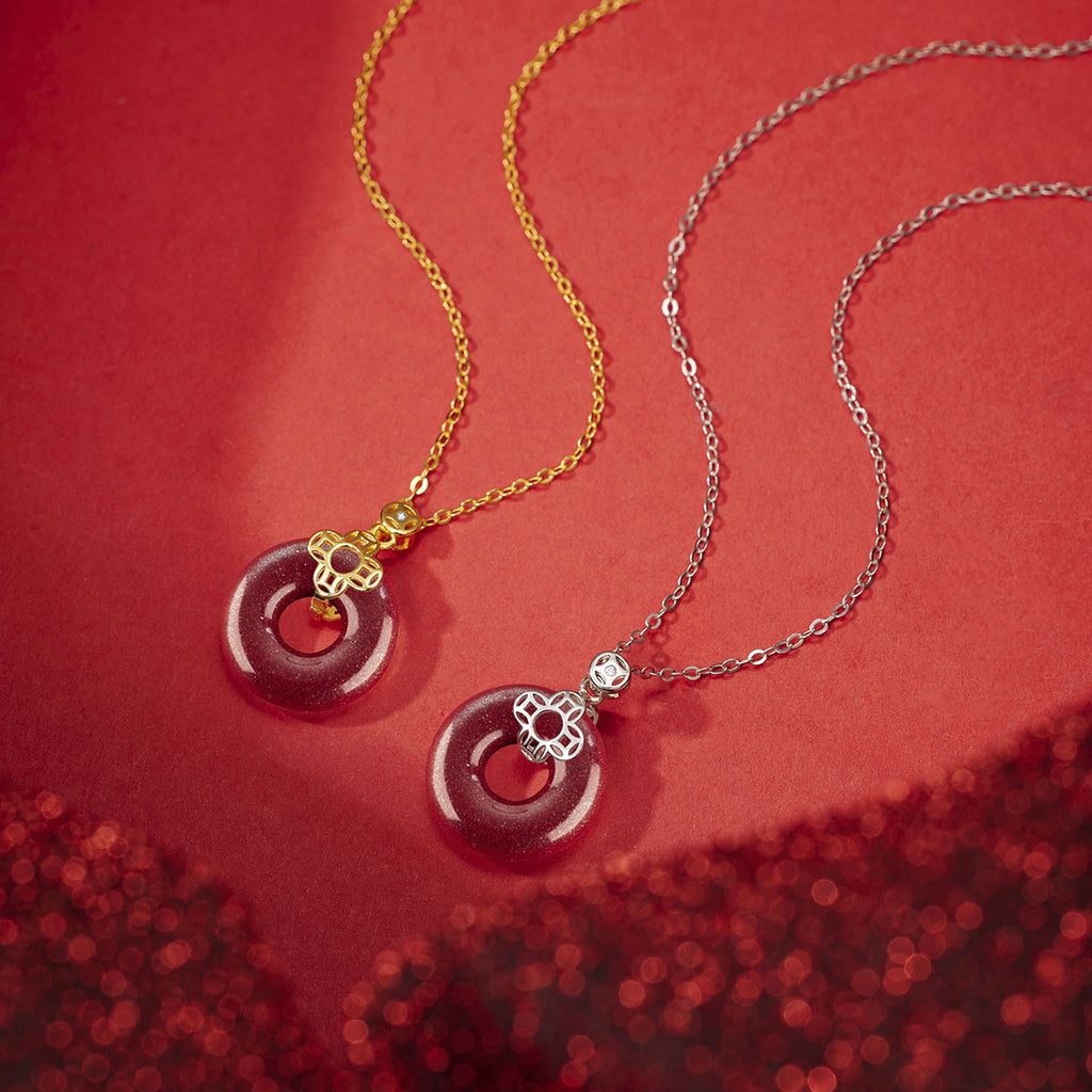 Damen Halskette mit kunstvollem Goldanhänger und elegantem Donut-Design Shop Nory