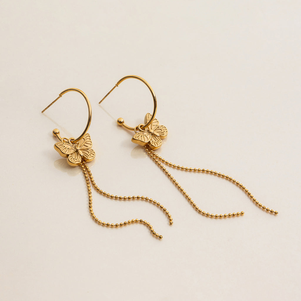 Damen Ohrhänger mit filigranem Schmetterlingsdesign und hängenden Kettendetails Shop Nory
