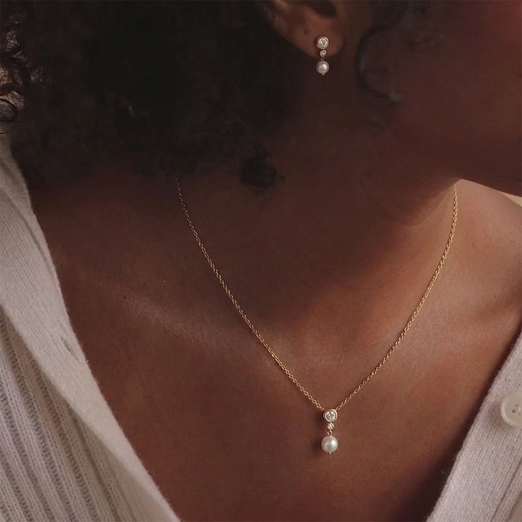 Damen Elegante Halskette mit Zirkonia und Perlenanhänger Shop Nory