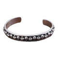 Damen Armreif mit kunstvollem Totenkopf-Design und filigraner Struktur Shop Nory