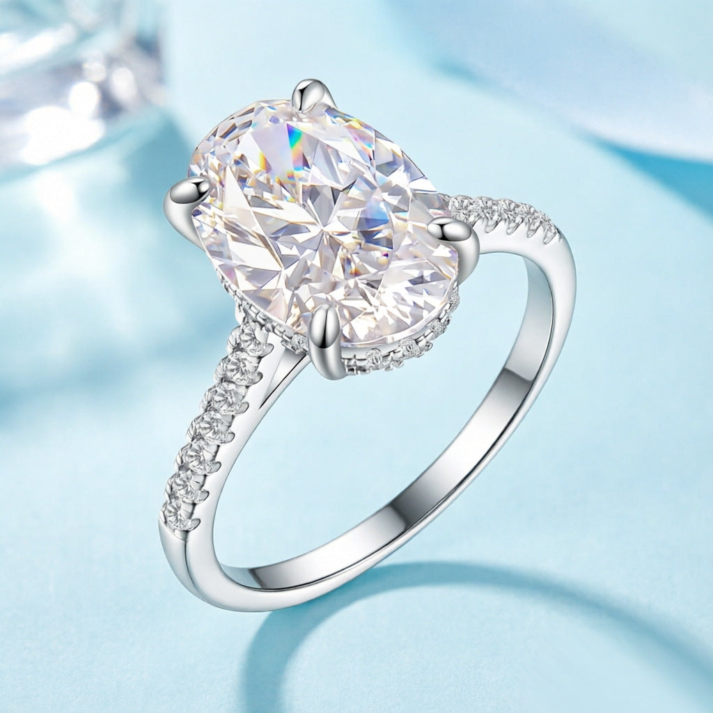 Damen eleganter Ring mit ovalem Hauptstein und feinem Zirkonia-Besatz Shop Nory
