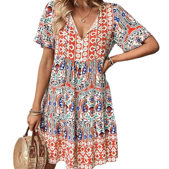 Damen Lockeres Stufen‑Midikleid mit V‑Ausschnitt, Quastenbindeband und Boho‑Print Shop Nory