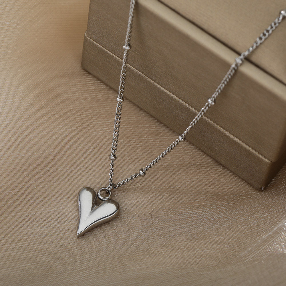Damen Halskette mit herzförmigem Anhänger aus hochwertigem Edelstahl Shop Nory