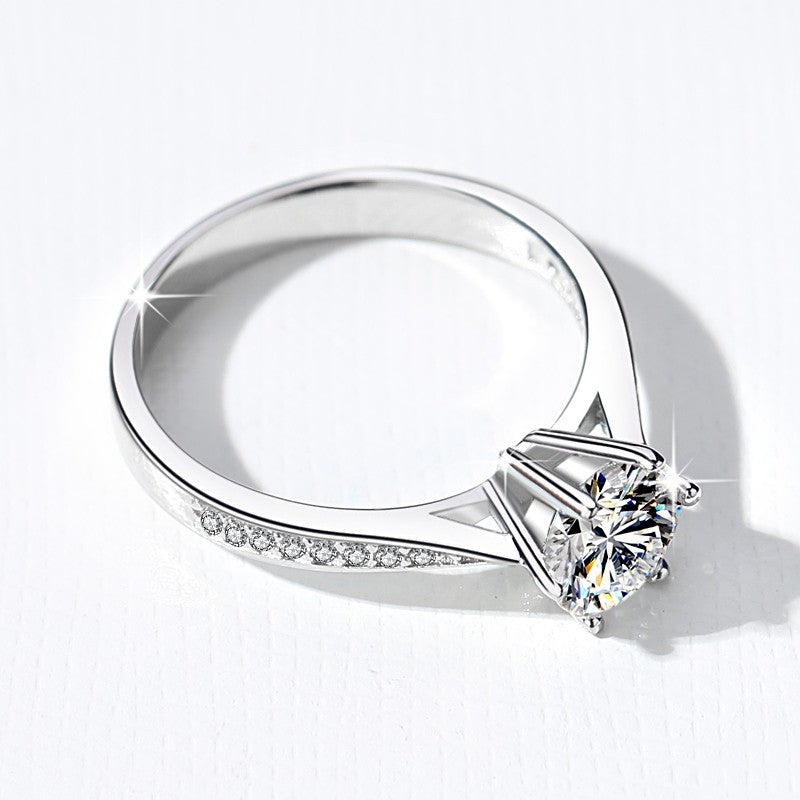 Damen Verlobungsring mit strahlendem Zirkon und filigraner Detailverzierung Shop Nory